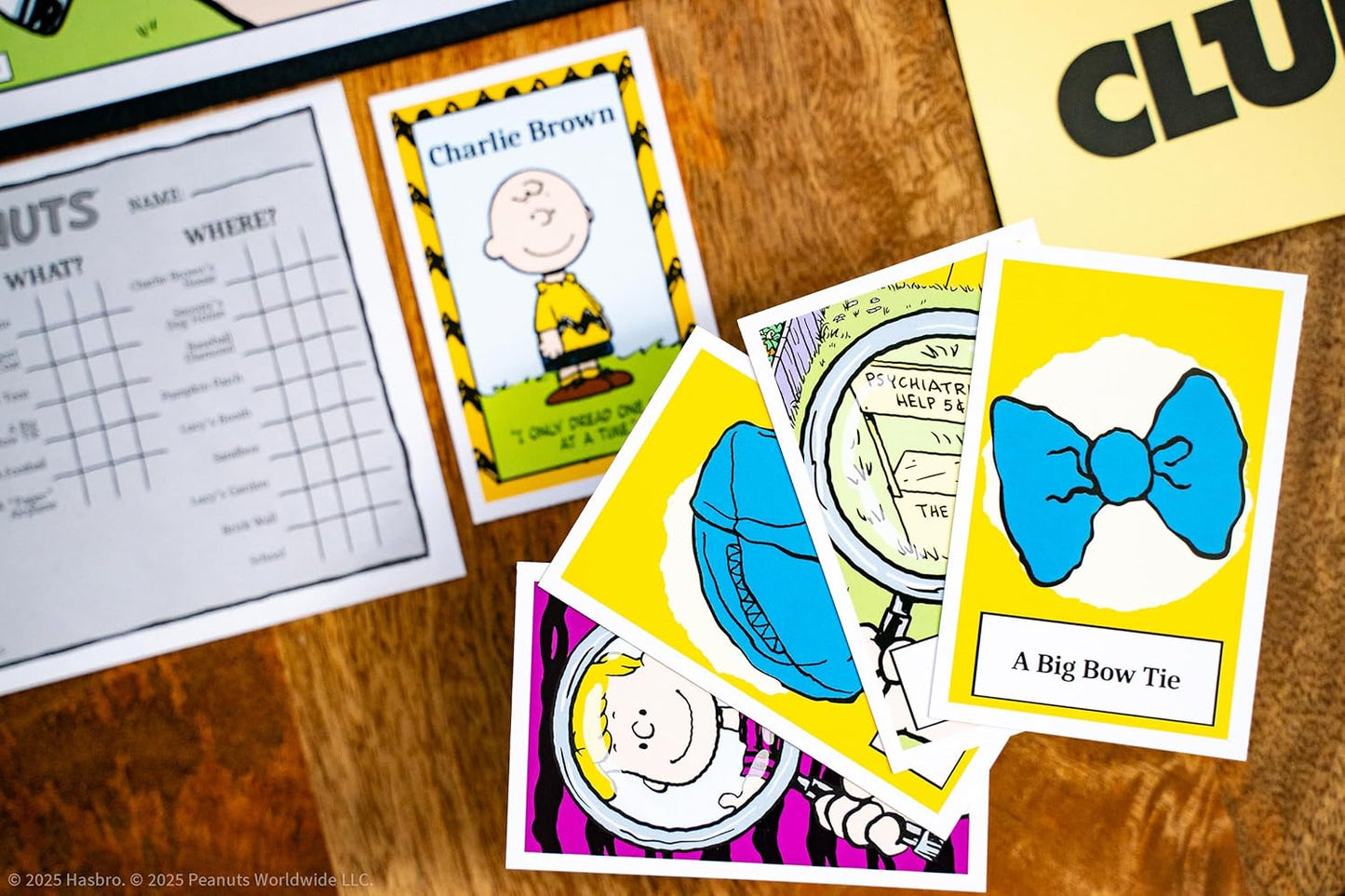 CLUE: Peanuts Board Game, Solve The Mystery of Linus's Missing Blanket with Charlie Brown, Snoopy, & Friends, Explore Iconic Locations Like Lucy’s Booth & Charlie’s House, Officially Licensed Game